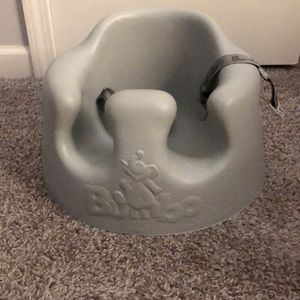 Gray bumbo infant seat.